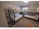 Bedroom with bunk beds, perfect for or guests at 6811 W Monona Dr, Glendale, AZ 85308