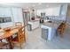 Spacious kitchen with white cabinets, stainless steel appliances, and an island at 6811 W Monona Dr, Glendale, AZ 85308