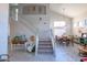 Elegant staircase leading to the upper level with decorative accents at 6811 W Monona Dr, Glendale, AZ 85308