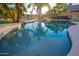 Relaxing swimming pool with palm trees and canal views at 6811 W Monona Dr, Glendale, AZ 85308