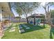 Backyard patio with artificial turf and gazebo at 7245 E Cambridge Ave, Scottsdale, AZ 85257