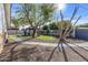 Landscaped backyard with artificial turf and gazebo at 7245 E Cambridge Ave, Scottsdale, AZ 85257