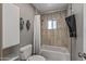 Bathroom with a shower/tub, tile surround, and a linen closet at 7245 E Cambridge Ave, Scottsdale, AZ 85257