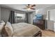 Bedroom with window, wood floor, and large dresser at 7245 E Cambridge Ave, Scottsdale, AZ 85257