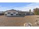 Single-story house with a spacious front yard and rock landscaping at 7245 E Cambridge Ave, Scottsdale, AZ 85257