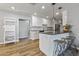 Modern kitchen with white shaker cabinets, quartz countertops and island at 7245 E Cambridge Ave, Scottsdale, AZ 85257