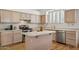 Kitchen with island and light wood cabinets at 7297 E Black Rock Rd, Scottsdale, AZ 85255