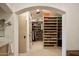 Large walk-in closet with ample shelving and hanging space at 7348 N Red Ledge Dr, Paradise Valley, AZ 85253