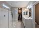 Modern bathroom with double vanity and walk-in shower at 7950 S 45Th Ave, Laveen, AZ 85339