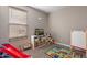 Playroom with toys, a fish tank, and a learning mat at 7950 S 45Th Ave, Laveen, AZ 85339