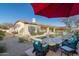 Relaxing backyard oasis with pool and fire pit at 8531 E Twisted Leaf Dr, Gold Canyon, AZ 85118