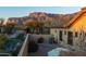 Landscaped backyard with mountain views and partial home view at 8531 E Twisted Leaf Dr, Gold Canyon, AZ 85118