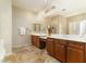 Spacious bathroom with and vanities and a large mirror at 8531 E Twisted Leaf Dr, Gold Canyon, AZ 85118