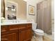 Bathroom with wood cabinets and shower/tub combo at 8531 E Twisted Leaf Dr, Gold Canyon, AZ 85118