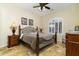 Bedroom with iron bed frame and wood nightstands at 8531 E Twisted Leaf Dr, Gold Canyon, AZ 85118