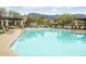 Sparkling community pool with ample seating at 8531 E Twisted Leaf Dr, Gold Canyon, AZ 85118