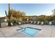 Relaxing community spa with surrounding seating at 8531 E Twisted Leaf Dr, Gold Canyon, AZ 85118