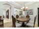 Bright dining room with a view into the living room and kitchen at 8531 E Twisted Leaf Dr, Gold Canyon, AZ 85118