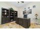 Spacious home office with built-in shelving and large desk at 8531 E Twisted Leaf Dr, Gold Canyon, AZ 85118