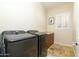 Well-lit laundry room with washer and dryer at 8531 E Twisted Leaf Dr, Gold Canyon, AZ 85118