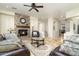 Cozy living room with fireplace and comfortable seating at 8531 E Twisted Leaf Dr, Gold Canyon, AZ 85118