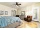 Serene main bedroom with a comfortable sitting area and large window at 8531 E Twisted Leaf Dr, Gold Canyon, AZ 85118