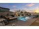 Stunning pool and spa with sunset view at 8531 E Twisted Leaf Dr, Gold Canyon, AZ 85118