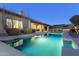 Relaxing rectangular pool in the backyard at dusk at 8531 E Twisted Leaf Dr, Gold Canyon, AZ 85118