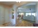 View from entryway into living room and dining area at 9 N Agua Fria Ln, Casa Grande, AZ 85194