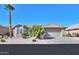 Single-story home with desert landscaping and two-car garage at 9 N Agua Fria Ln, Casa Grande, AZ 85194