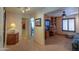 Home hallway with built-in shelving and office area at 9 N Agua Fria Ln, Casa Grande, AZ 85194