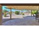 Relaxing patio with pergola, stone pavers, and golf course view at 9 N Agua Fria Ln, Casa Grande, AZ 85194