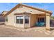 Covered patio with stone flooring and seating area at 9815 N Sunrise Cir, Fountain Hills, AZ 85268