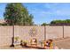 Relaxing backyard space with seating area and wall art at 9815 N Sunrise Cir, Fountain Hills, AZ 85268