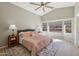 Main bedroom with wood floors and a ceiling fan at 9815 N Sunrise Cir, Fountain Hills, AZ 85268