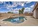 Sparkling kidney shaped pool, perfect for relaxation at 9909 W Miami St, Tolleson, AZ 85353