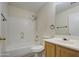 Full bathroom with shower/tub combo and wood vanity at 9909 W Miami St, Tolleson, AZ 85353