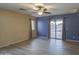 Bedroom with sliding glass doors and pool access at 9909 W Miami St, Tolleson, AZ 85353