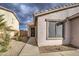 Front entrance with walkway and desert landscaping at 9909 W Miami St, Tolleson, AZ 85353