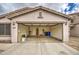 Two-car garage with ample space for storage at 9909 W Miami St, Tolleson, AZ 85353