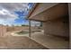 Covered patio overlooking a sparkling pool at 9909 W Miami St, Tolleson, AZ 85353