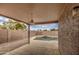 Covered patio overlooking a sparkling pool at 9909 W Miami St, Tolleson, AZ 85353