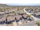 Aerial view of house and neighborhood, showcasing desert landscape and mountain views at 10255 E Golden Rim Cir, Gold Canyon, AZ 85118