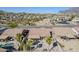 Aerial view of a home's backyard with a pool and desert landscaping at 10255 E Golden Rim Cir, Gold Canyon, AZ 85118