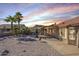 Backyard patio with seating area and mountain views at 10255 E Golden Rim Cir, Gold Canyon, AZ 85118