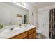 Bathroom with double vanity and bathtub at 10255 E Golden Rim Cir, Gold Canyon, AZ 85118