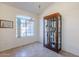 Dining area with large window and display cabinet at 10255 E Golden Rim Cir, Gold Canyon, AZ 85118