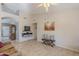 Spacious living room with a ceiling fan, tiled floor and comfortable seating at 10255 E Golden Rim Cir, Gold Canyon, AZ 85118