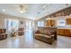 Open floor plan with a kitchen, living room and access to the backyard at 10255 E Golden Rim Cir, Gold Canyon, AZ 85118