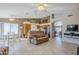 Open concept living area with kitchen, breakfast nook, and a comfortable couch at 10255 E Golden Rim Cir, Gold Canyon, AZ 85118